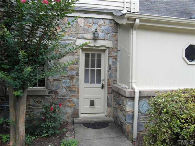 2216 St Marys Street Raleigh, NC 27608 - Photo 24 of 25 Side entrance.....Port-hole type window is the walk-in pantry in the kitchen.....