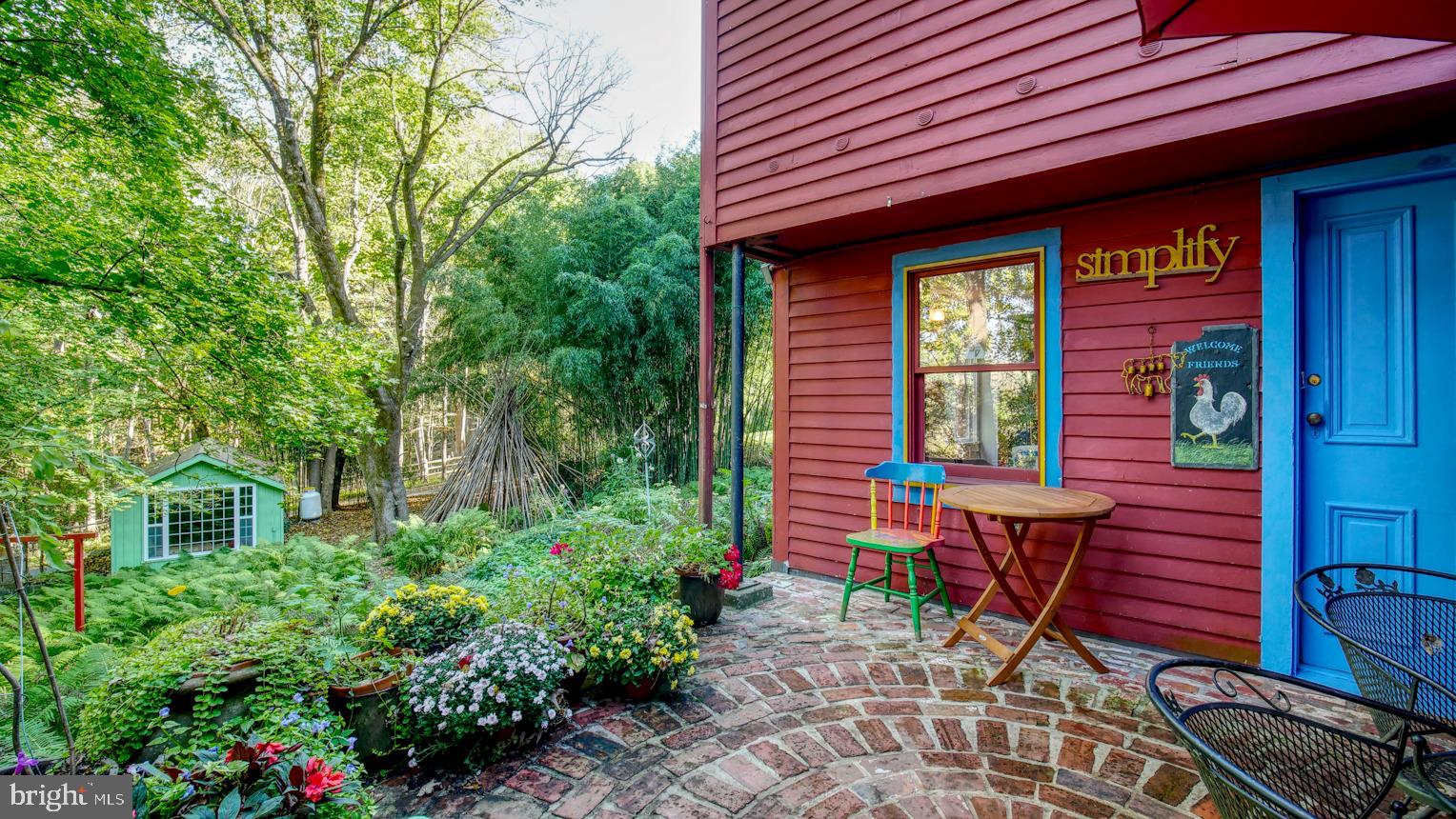 7416 Ferry Road New Hope, PA 18938 - Photo 25 of 33 a backyard of a house with outdoor seating