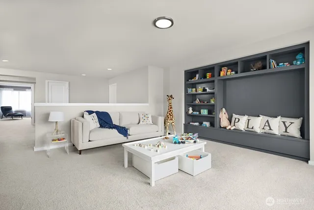 a bedroom with bed and a night stand