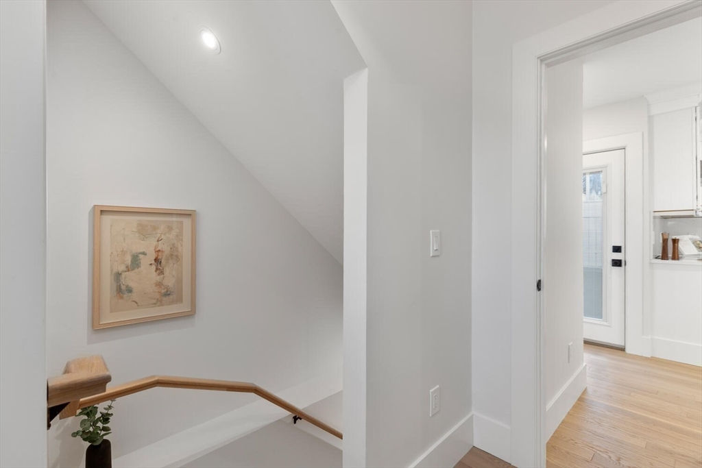 7 Bennett Street, Unit 1 Medford, MA 02155 - Photo 20 of 38 a view of a hallway with entryway