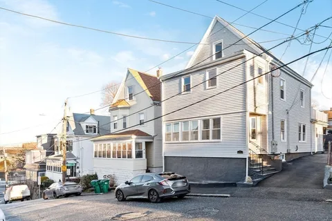 a car parked in front of a building