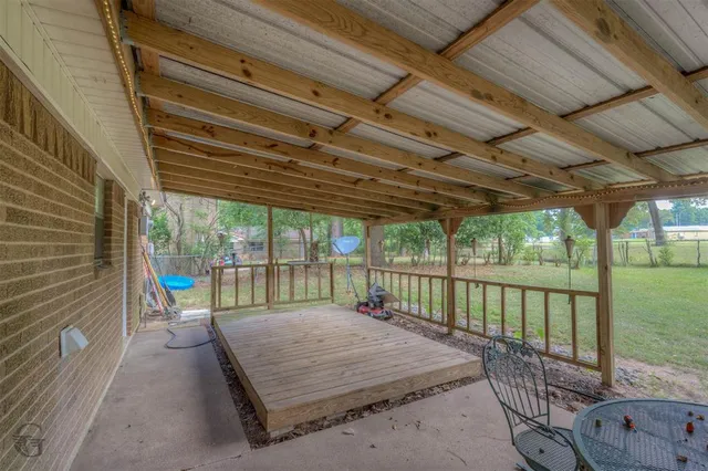 a balcony with an outdoor seating