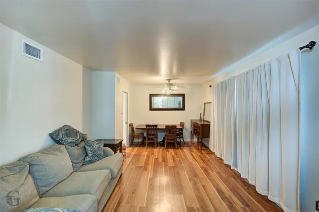a living room with furniture and a table