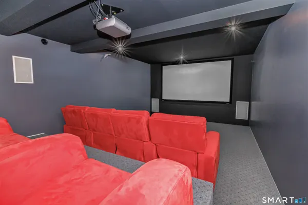 a bed room with a bed and a flat screen tv
