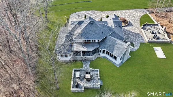 an aerial view of a house with a garden