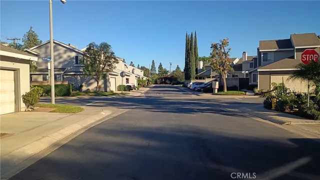 a view of a street with houses
