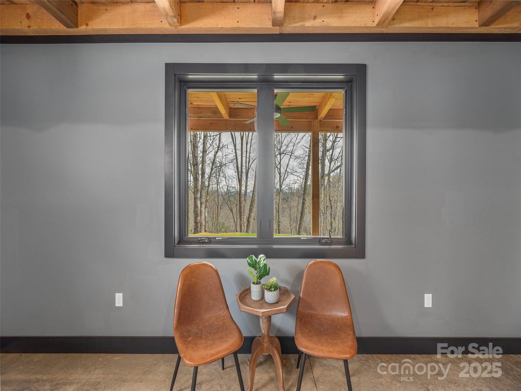 55 Dean Riddle Drive Waynesville, NC 28785 - Photo 17 of 35 a dining room with furniture and a window