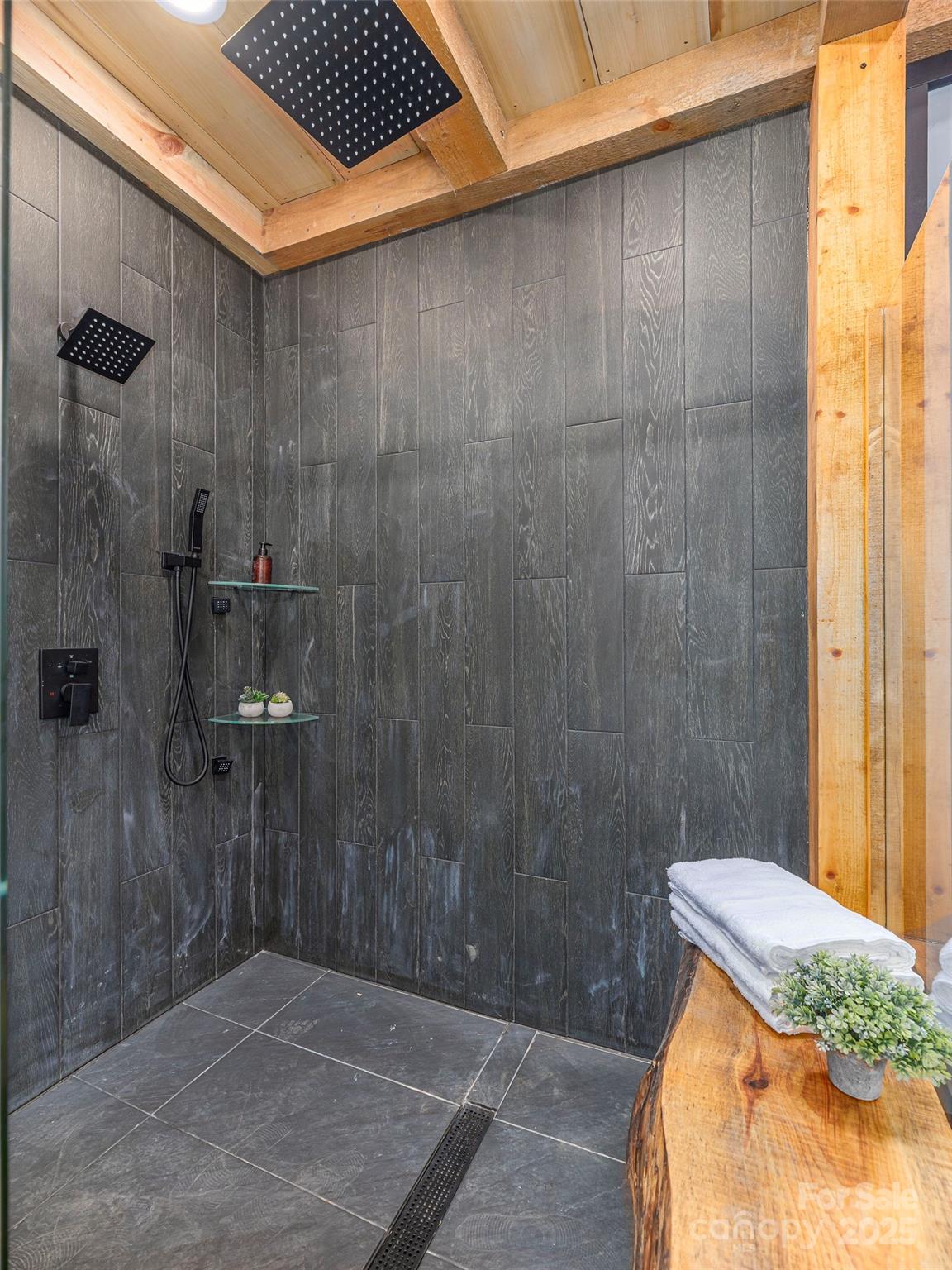 55 Dean Riddle Drive Waynesville, NC 28785 - Photo 21 of 35 a bathroom with a shower