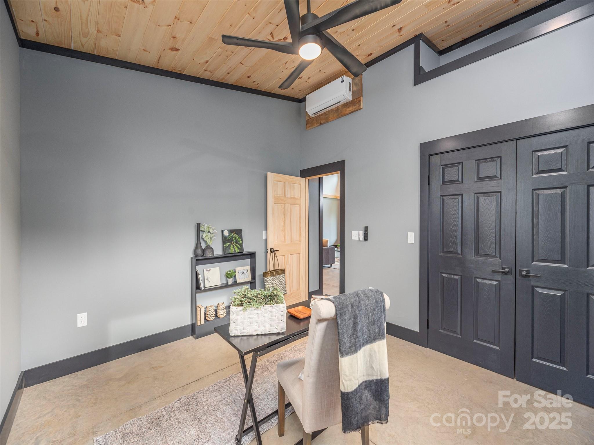 55 Dean Riddle Drive Waynesville, NC 28785 - Photo 27 of 35 a view of a dining room with furniture