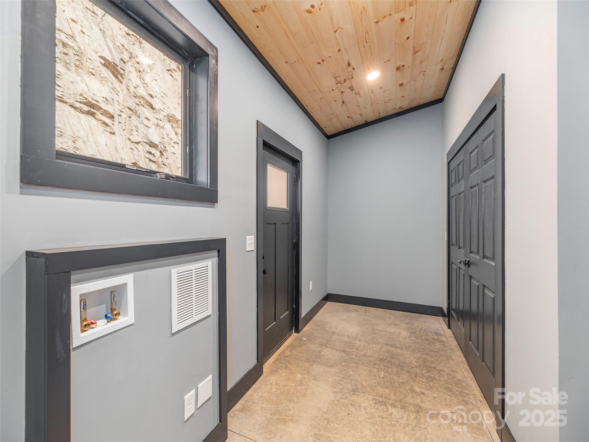 55 Dean Riddle Drive Waynesville, NC 28785 - Photo 29 of 35 a view of hallway with windows