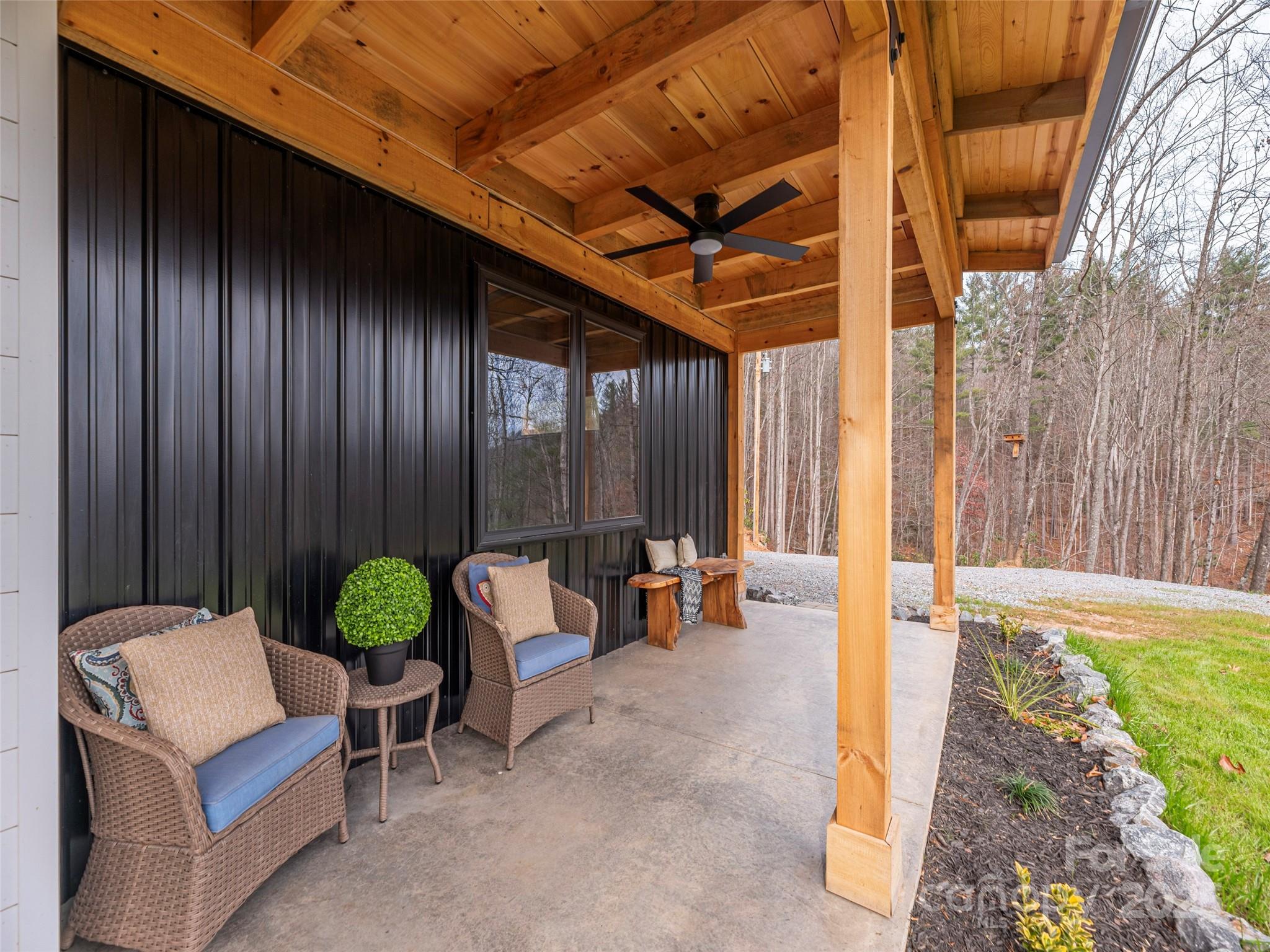 55 Dean Riddle Drive Waynesville, NC 28785 - Photo 4 of 35 a view of an outdoor sitting area with couch
