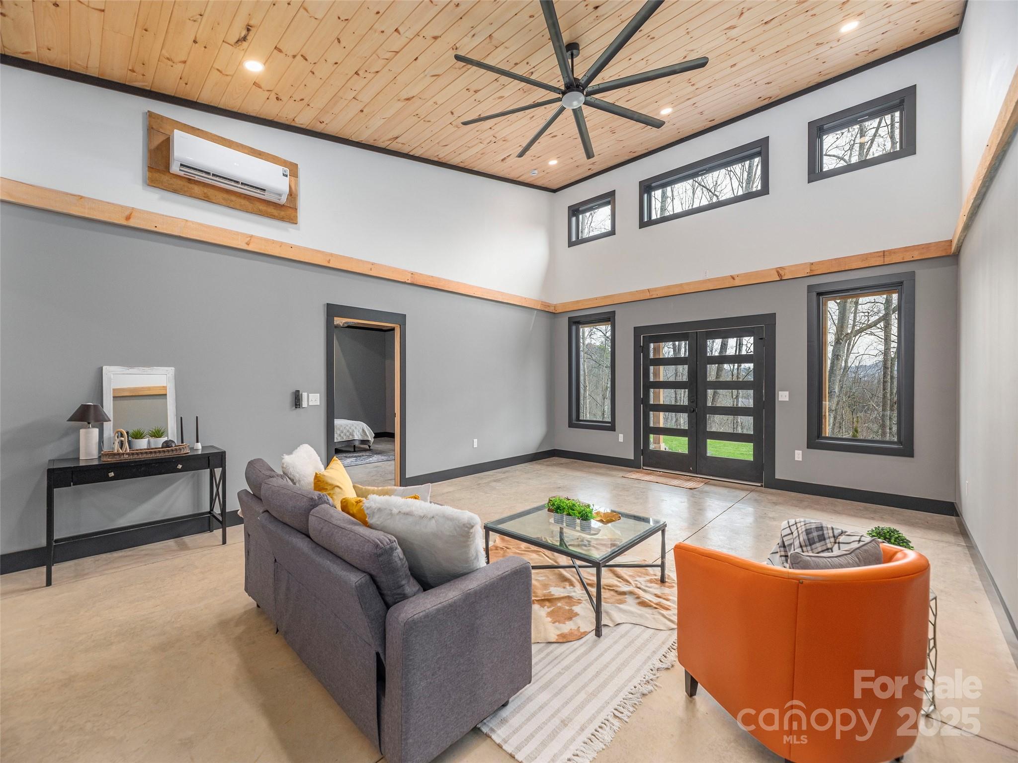 55 Dean Riddle Drive Waynesville, NC 28785 - Photo 7 of 35 a living room with furniture and window