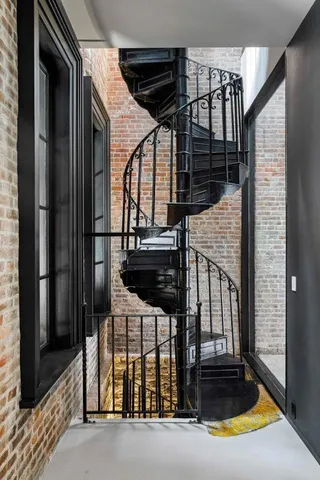 a bathroom with a sink toilet a mirror and vanity