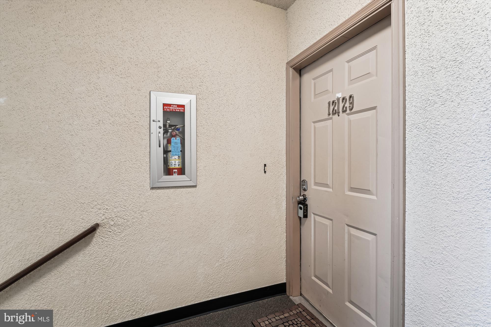 12129 Chaucer Lane, Unit 12129 Woodbridge, VA 22192 - Photo 19 of 31 a view of a closet area with an empty room
