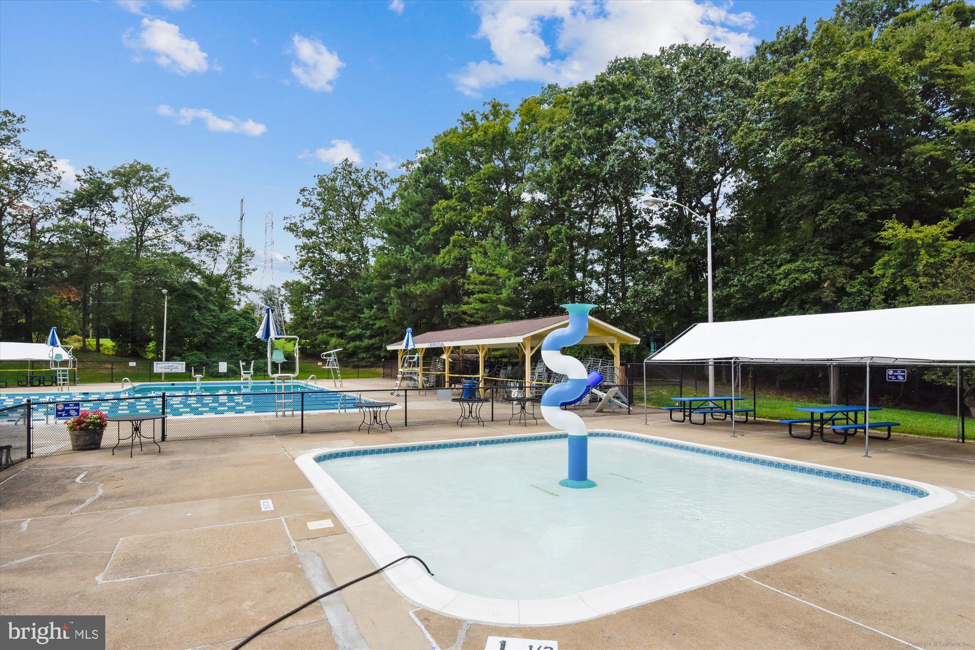 12129 Chaucer Lane, Unit 12129 Woodbridge, VA 22192 - Photo 21 of 31 a view of a park with swings