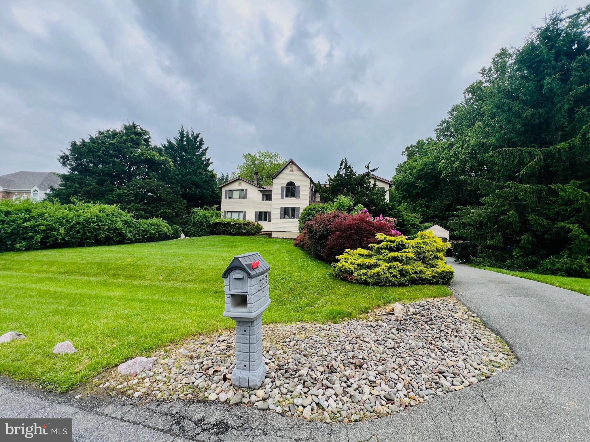 15729 Holly Grove Road Silver Spring, MD 20905 - Photo 1 of 83 Charming home nestled in lush greenery.