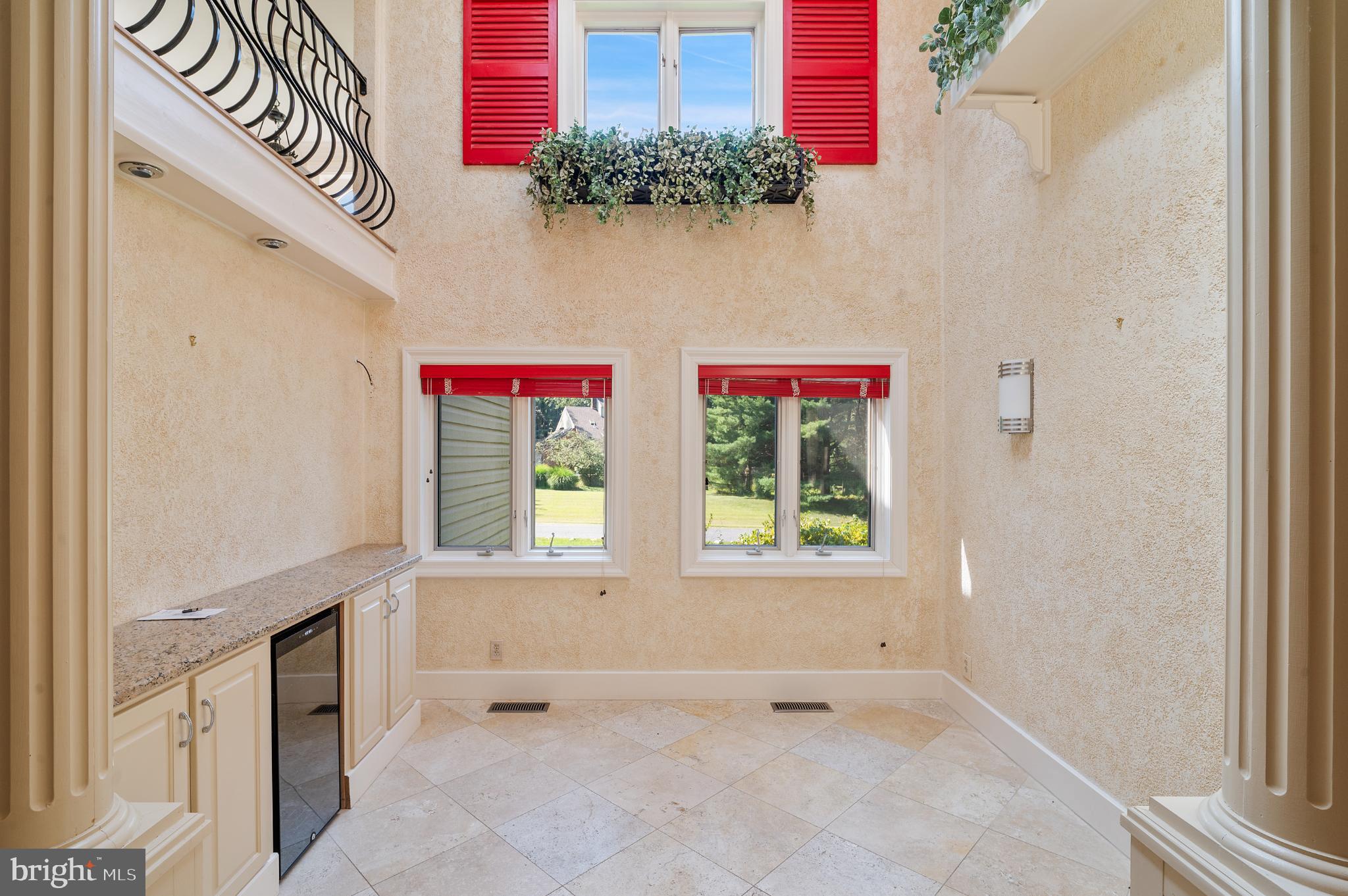 15729 Holly Grove Road Silver Spring, MD 20905 - Photo 21 of 83 a view of an entryway with a window and a ceiling fan