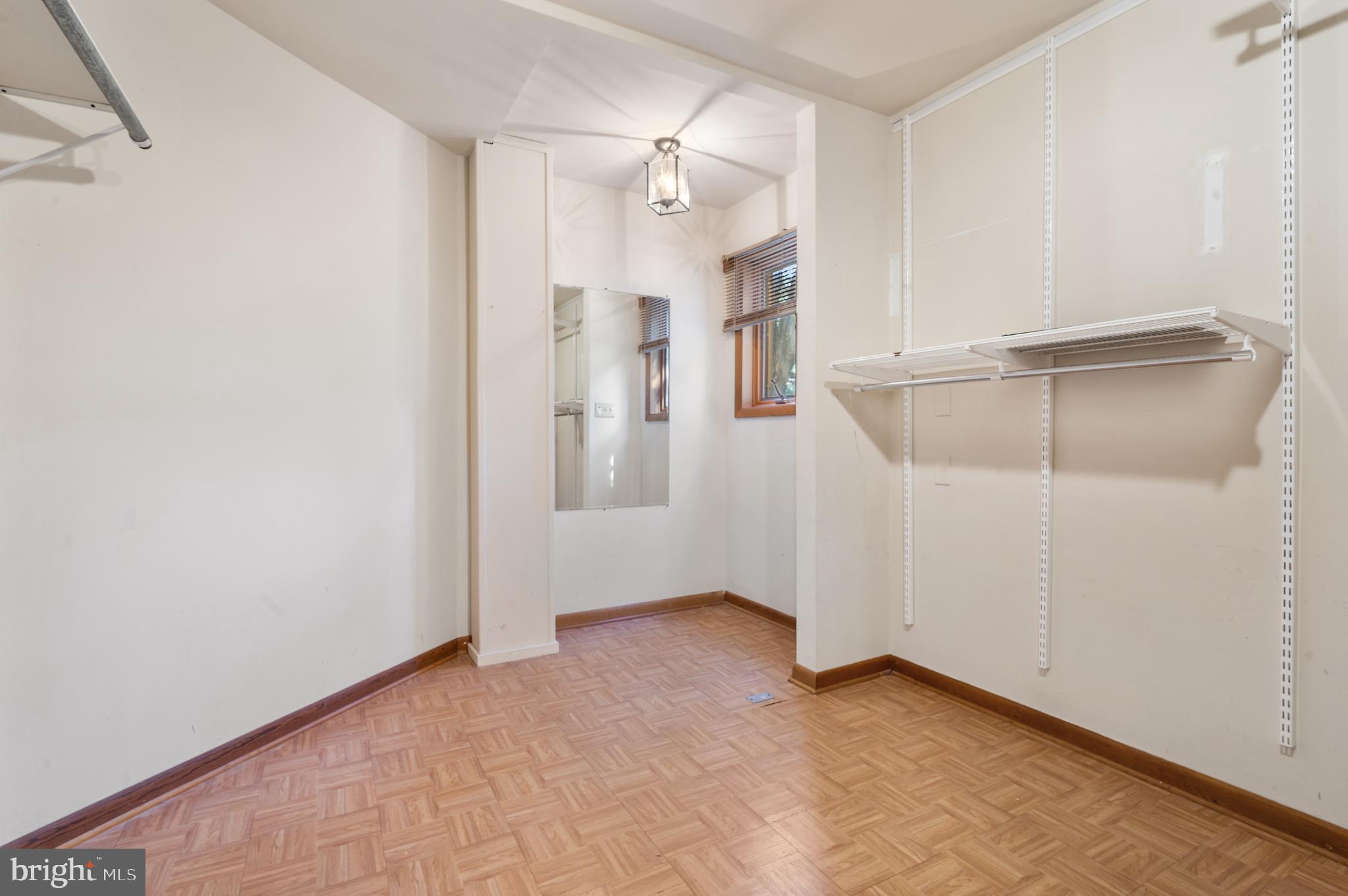15729 Holly Grove Road Silver Spring, MD 20905 - Photo 39 of 83 Spacious, versatile coat room with natural light.