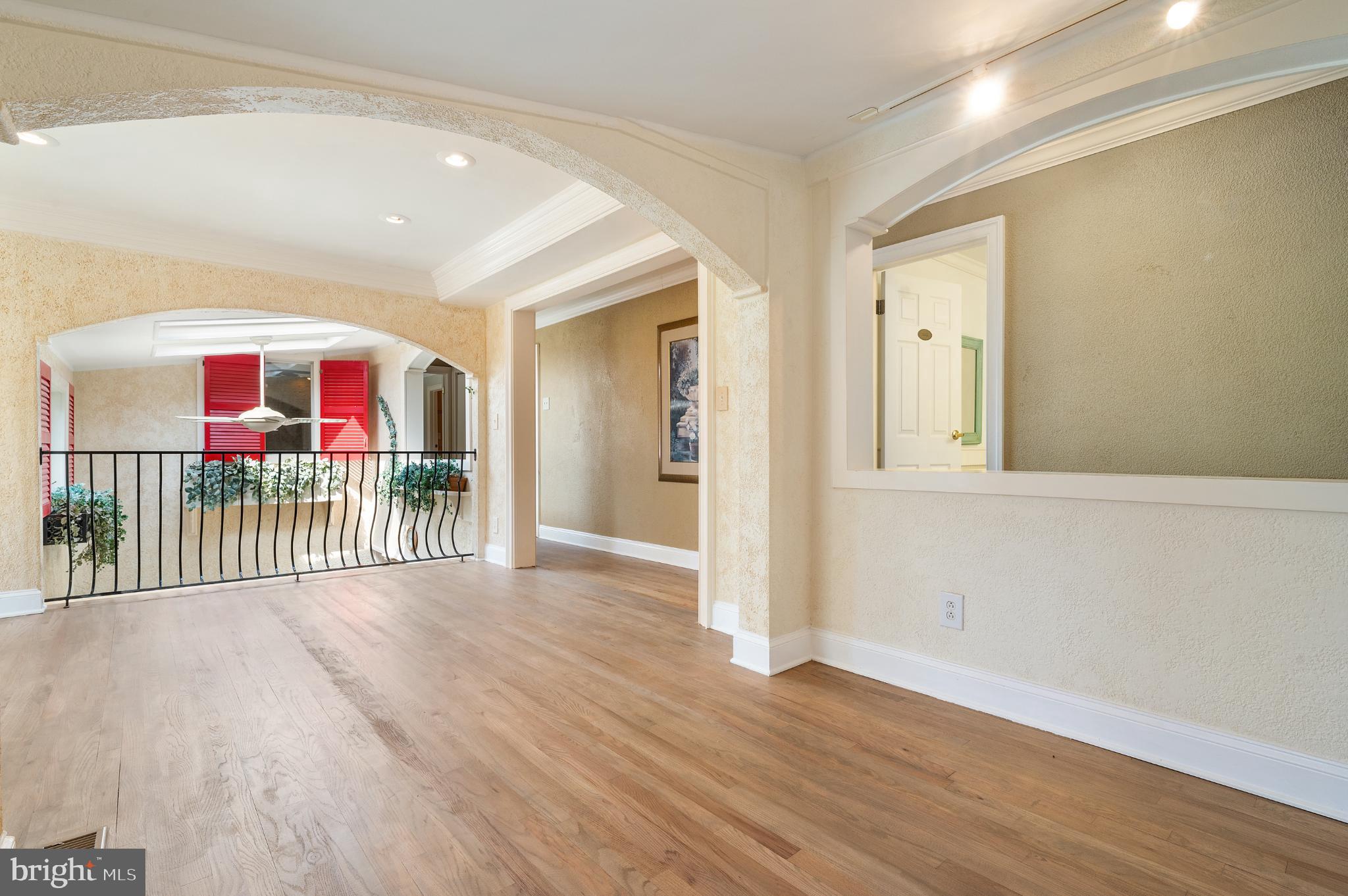 15729 Holly Grove Road Silver Spring, MD 20905 - Photo 45 of 83 Spacious entryway with elegant arches.