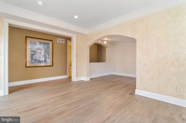a view of balcony with wooden floor