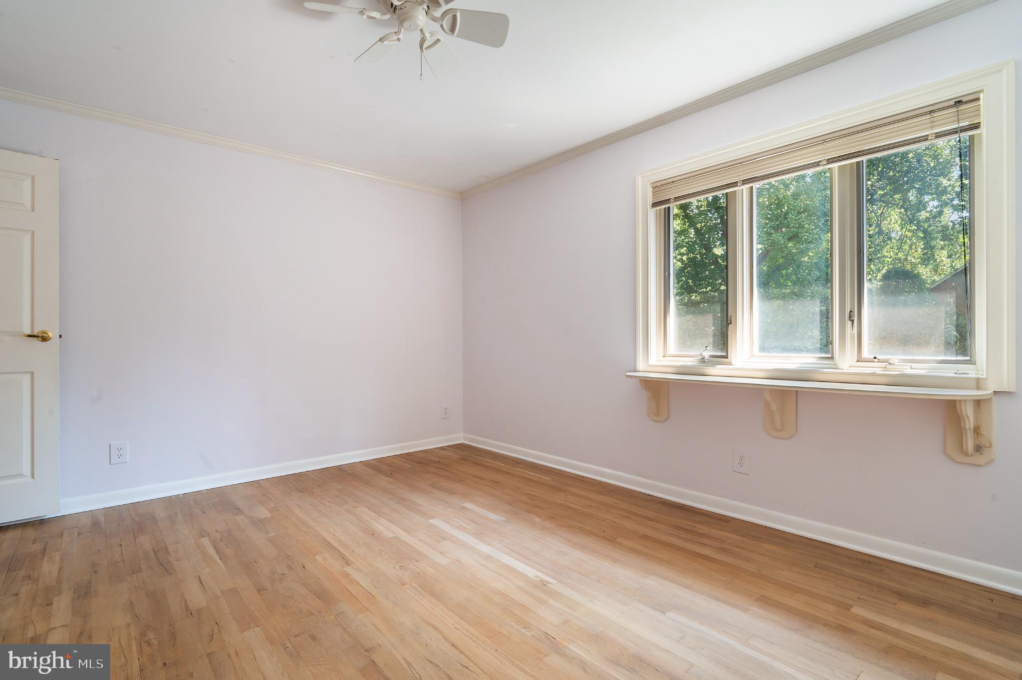 15729 Holly Grove Road Silver Spring, MD 20905 - Photo 55 of 83 Bright and airy bedroom 2 with natural light.