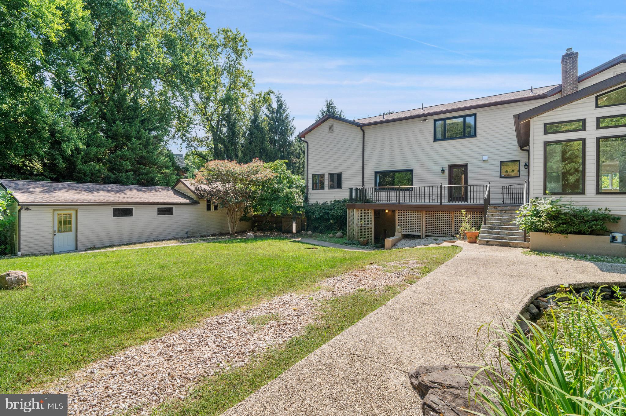 15729 Holly Grove Road Silver Spring, MD 20905 - Photo 66 of 83 a front view of house with yard and green space