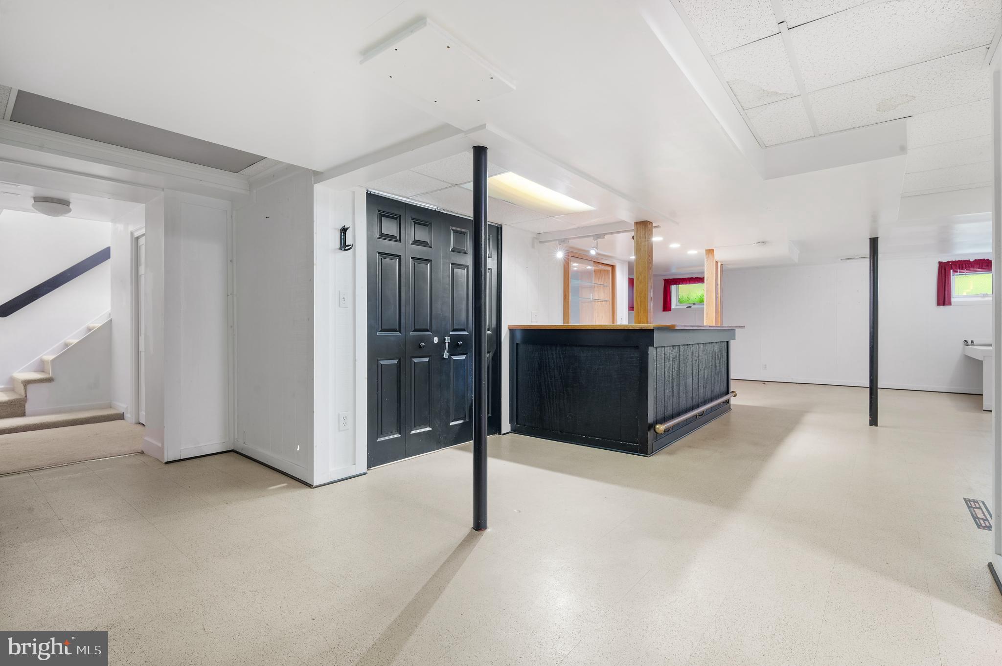 15729 Holly Grove Road Silver Spring, MD 20905 - Photo 72 of 83 Spacious, versatile basement with modern flair.