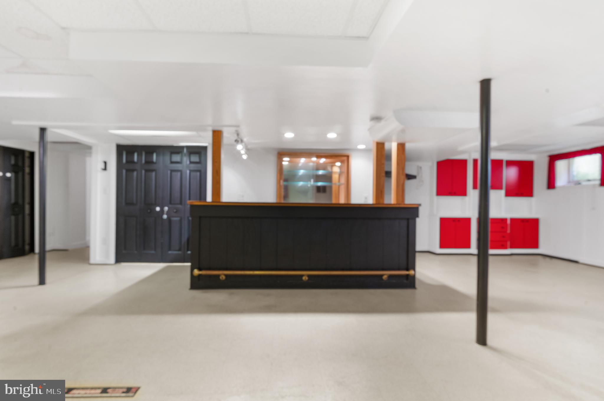 15729 Holly Grove Road Silver Spring, MD 20905 - Photo 73 of 83 Versatile space with a stylish bar area.