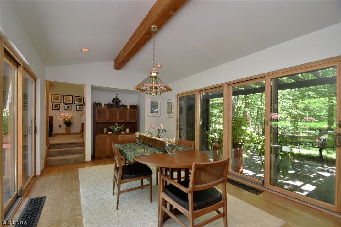 4259 Brainard Road Chagrin Falls, OH 44022 - Photo 12 of 32 Dining room with sliders to deck and door to studio