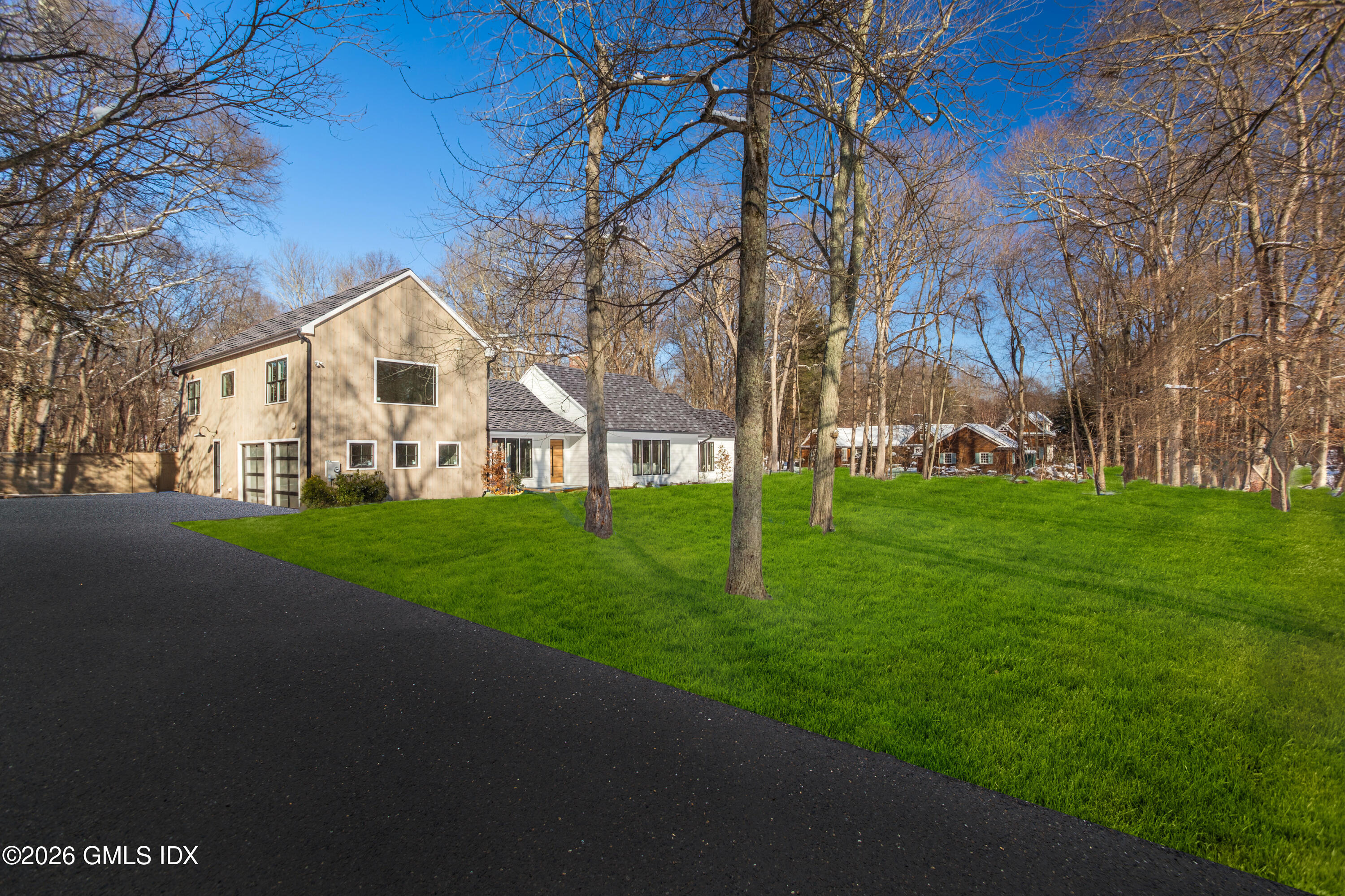 49 Salisbury Road Darien, CT 06820 - Photo 39 of 40 a view of house with garden