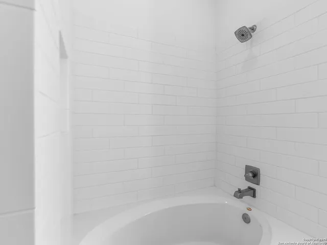 a bathroom with a bathtub