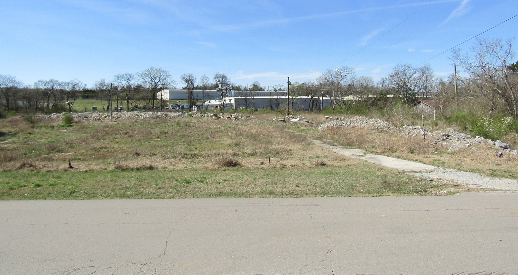 a view of a lake with houses in the back