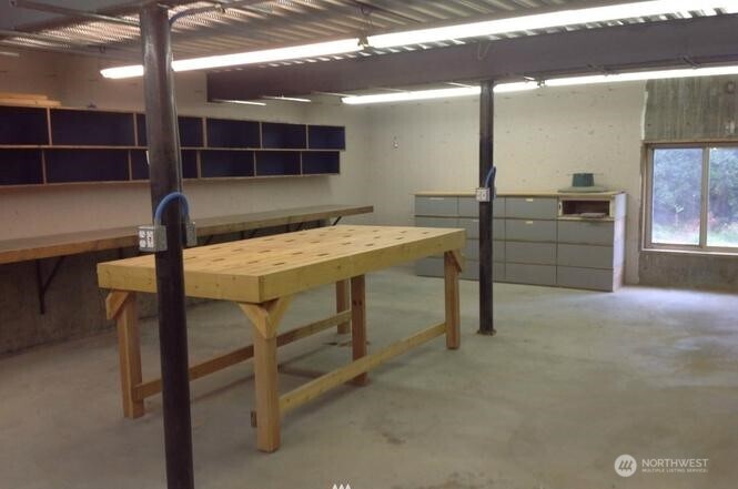 3639 Ridgeview Boulevard Wenatchee, WA 98801 - Photo 22 of 36 a view of a room with shelves