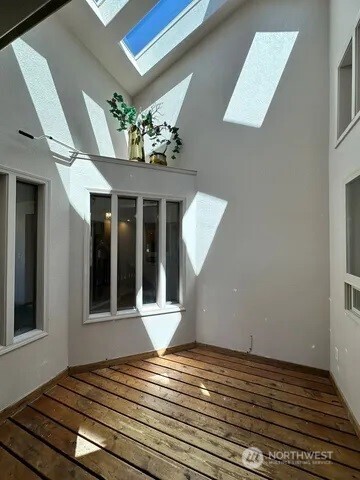 3639 Ridgeview Boulevard Wenatchee, WA 98801 - Photo 34 of 36 a view of wooden floor and cabinet