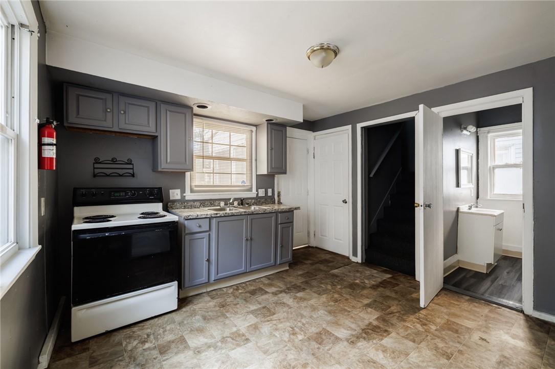 67 Berlin Street Rochester, NY 14621 - Photo 13 of 25 Kitchen - stairs to send floor and basement are in the kitchen