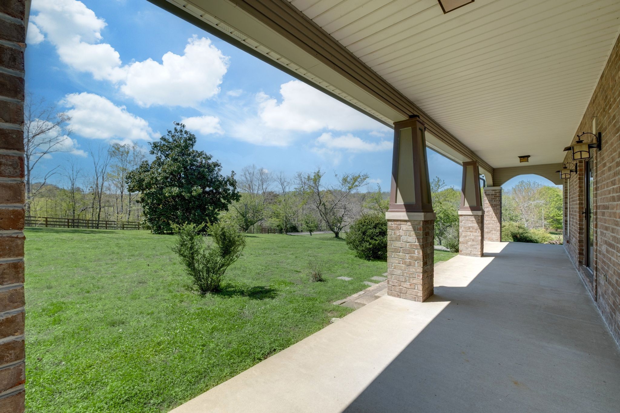 1249 White Road Bon Aqua, TN 37025 - Photo 3 of 60 a view of a porch with a garden