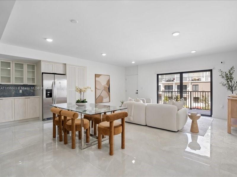 14608 Southwest 261st Terrace Homestead, FL 33032 - Photo 15 of 26 a living room with furniture and a large window