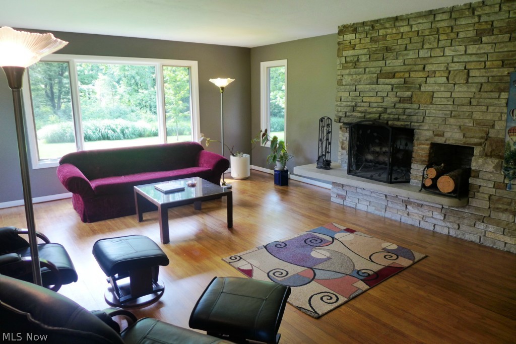 7609 Dines Road Novelty, OH 44072 - Photo 8 of 25 You can see the great views (even prettier in winter!) and when this fireplace is going, it may be tempting to take a snow day from work, get a hot drink and grab a good book!