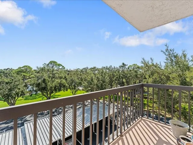 a balcony with an outdoor space