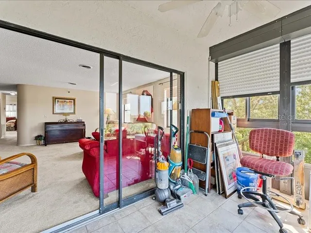 a bedroom with bed and a window