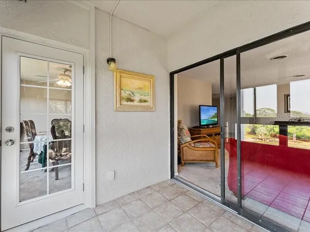 a view of a livingroom with dining room and furniture