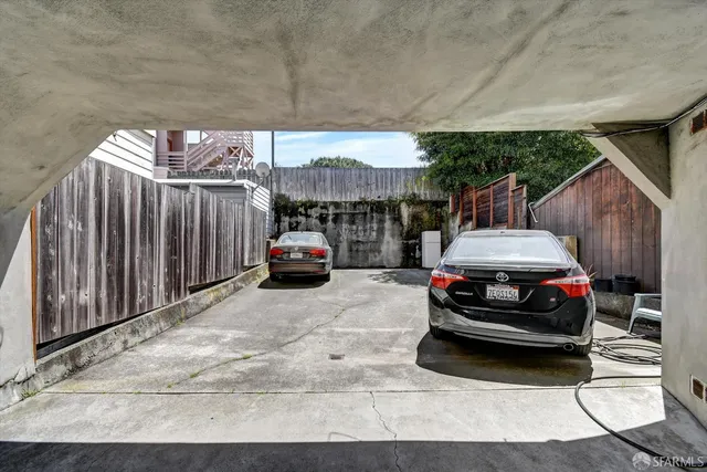 a car parked in front of a house
