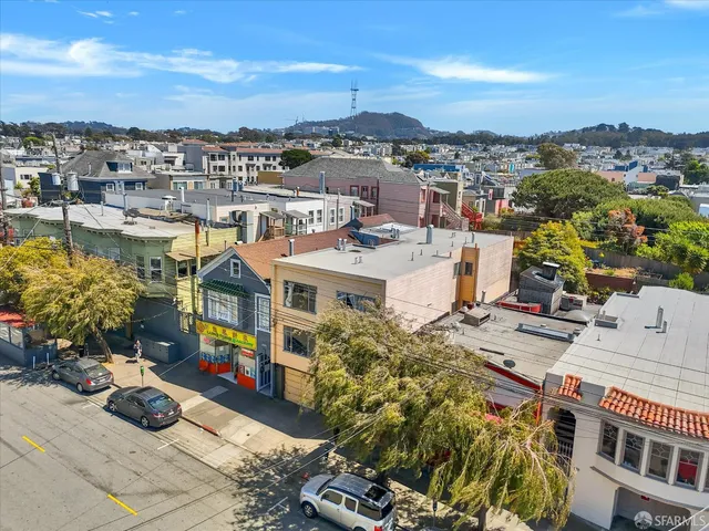 a view of city with tall buildings