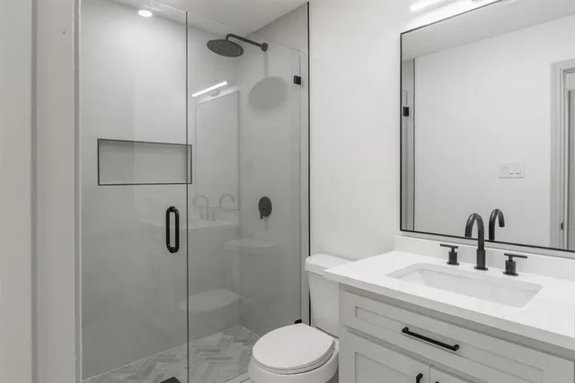 a view of a back yard from a balcony