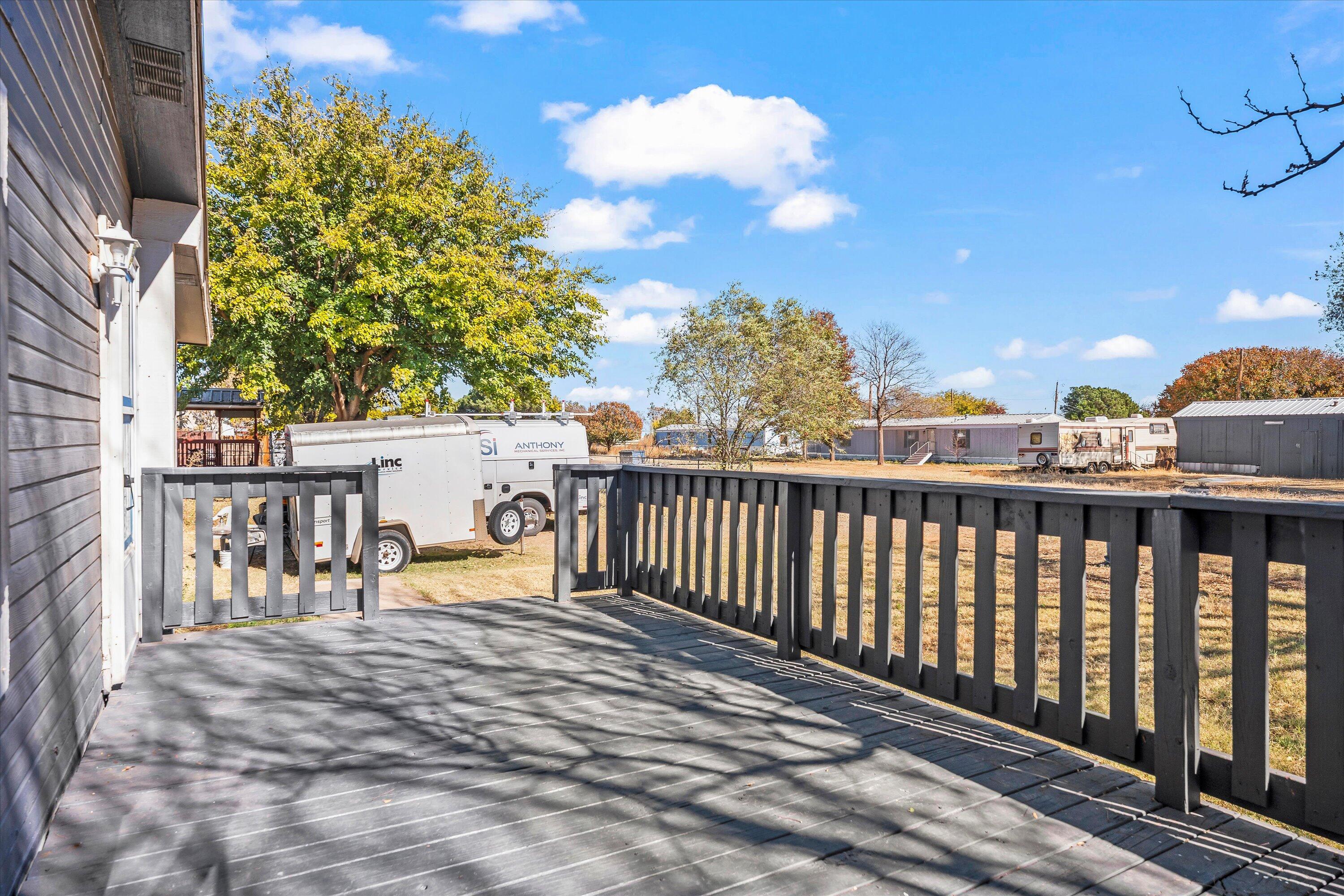 9909 North Chester Avenue Lubbock, TX 79415 - Photo 3 of 24 a view of a balcony with chairs