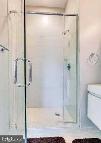 a bathroom with a bathtub and a sink