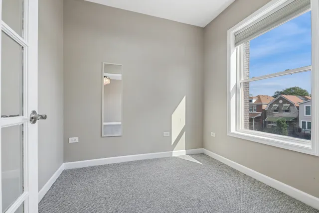 an empty room that has a window