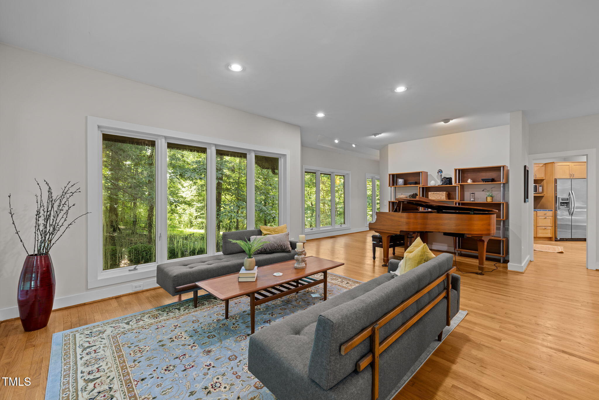 801 Creekstone Drive Chapel Hill, NC 27516 - Photo 7 of 65 a living room with furniture and a rug