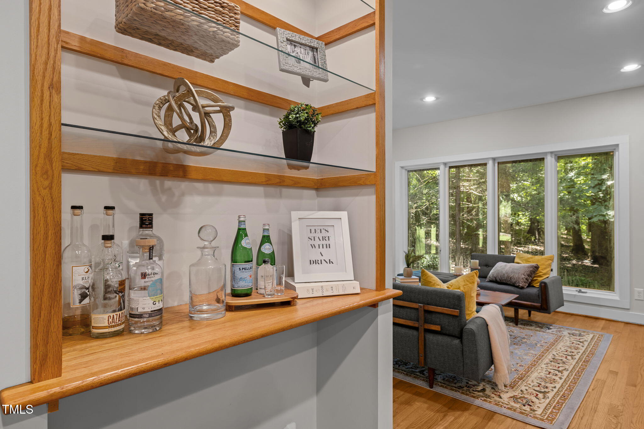 801 Creekstone Drive Chapel Hill, NC 27516 - Photo 10 of 65 a view of a livingroom with furniture window and outside view