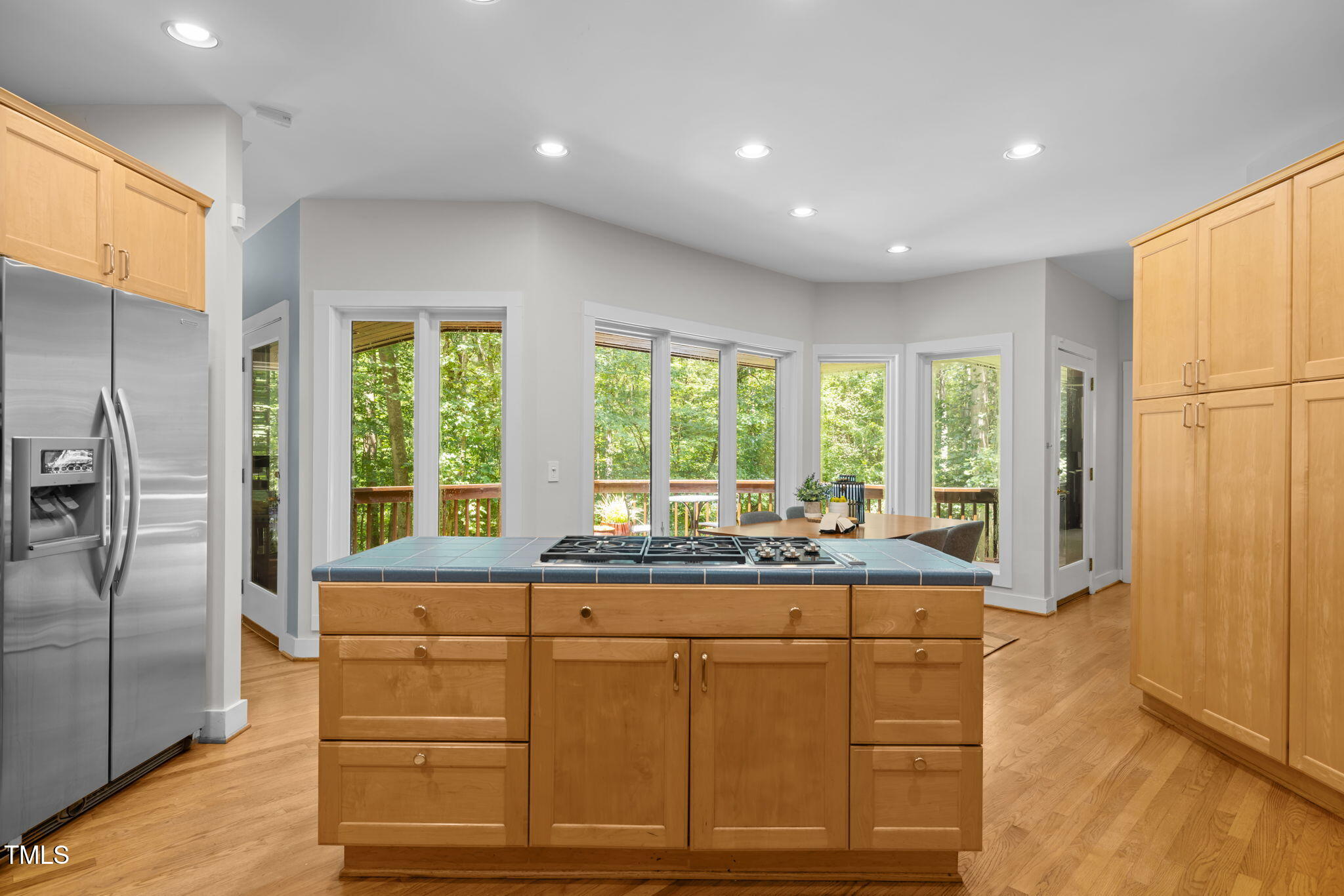 801 Creekstone Drive Chapel Hill, NC 27516 - Photo 13 of 65 a living room with furniture and large windows